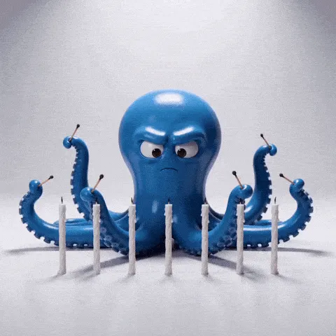 octopus candles happy birthday GIF — blue cartoon octopus spreading its arms around a row of candles