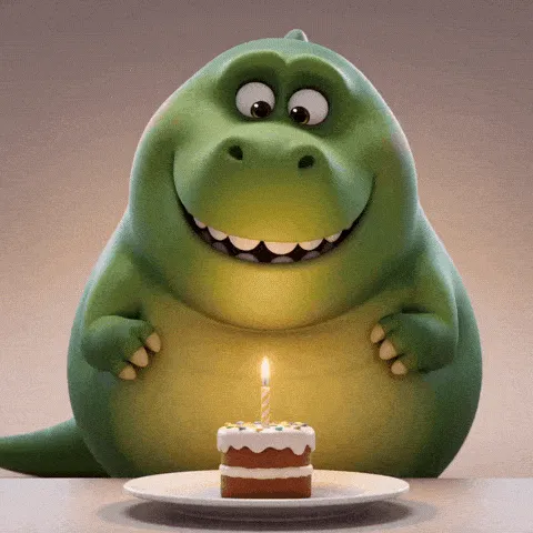 trex shortarms happy birthday GIF — round green dinosaur reaching toward a small candlelit cake